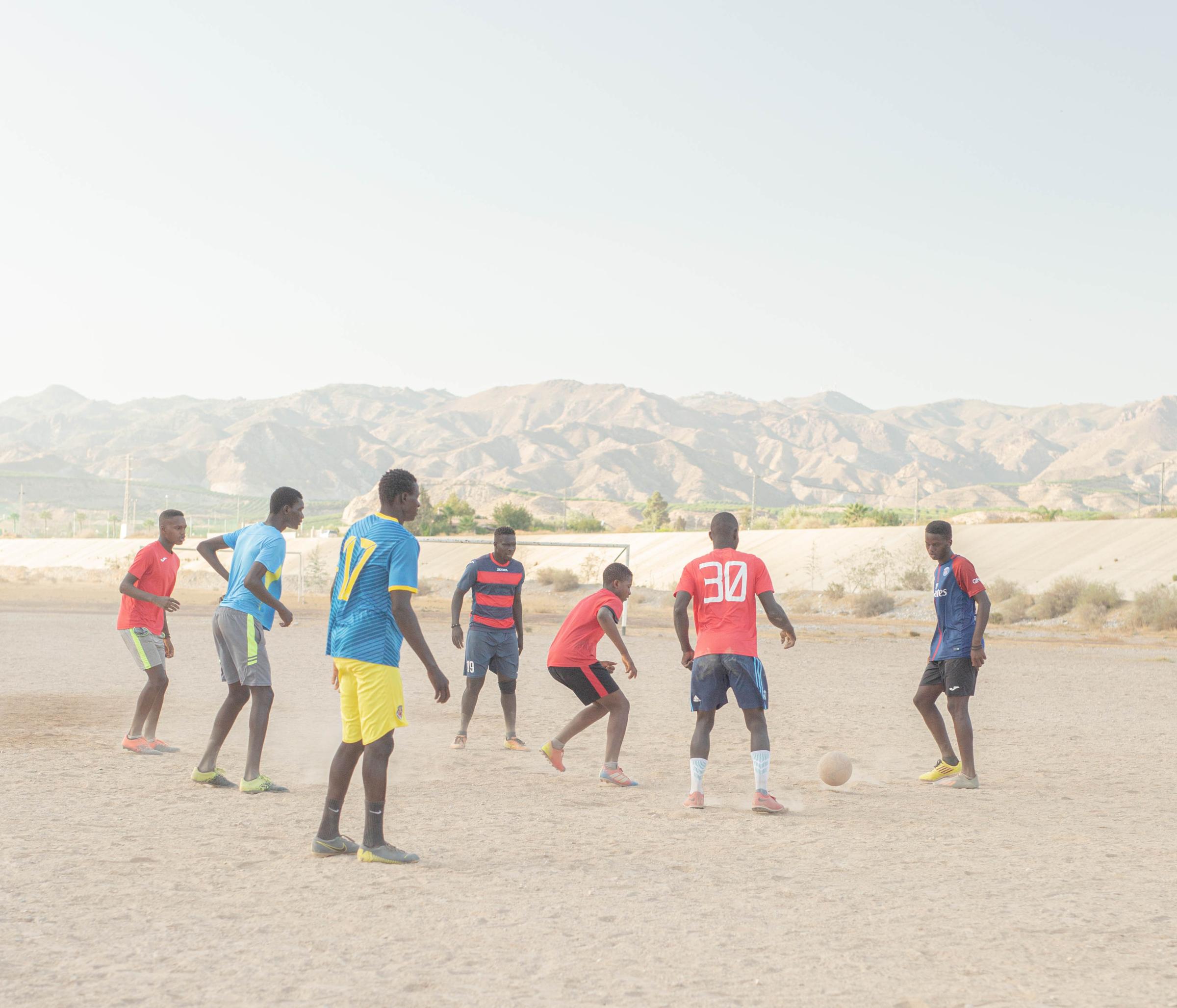 Eroding Franco (Árida) -  A young Senegalese team enjoys a game in the Almanzora...