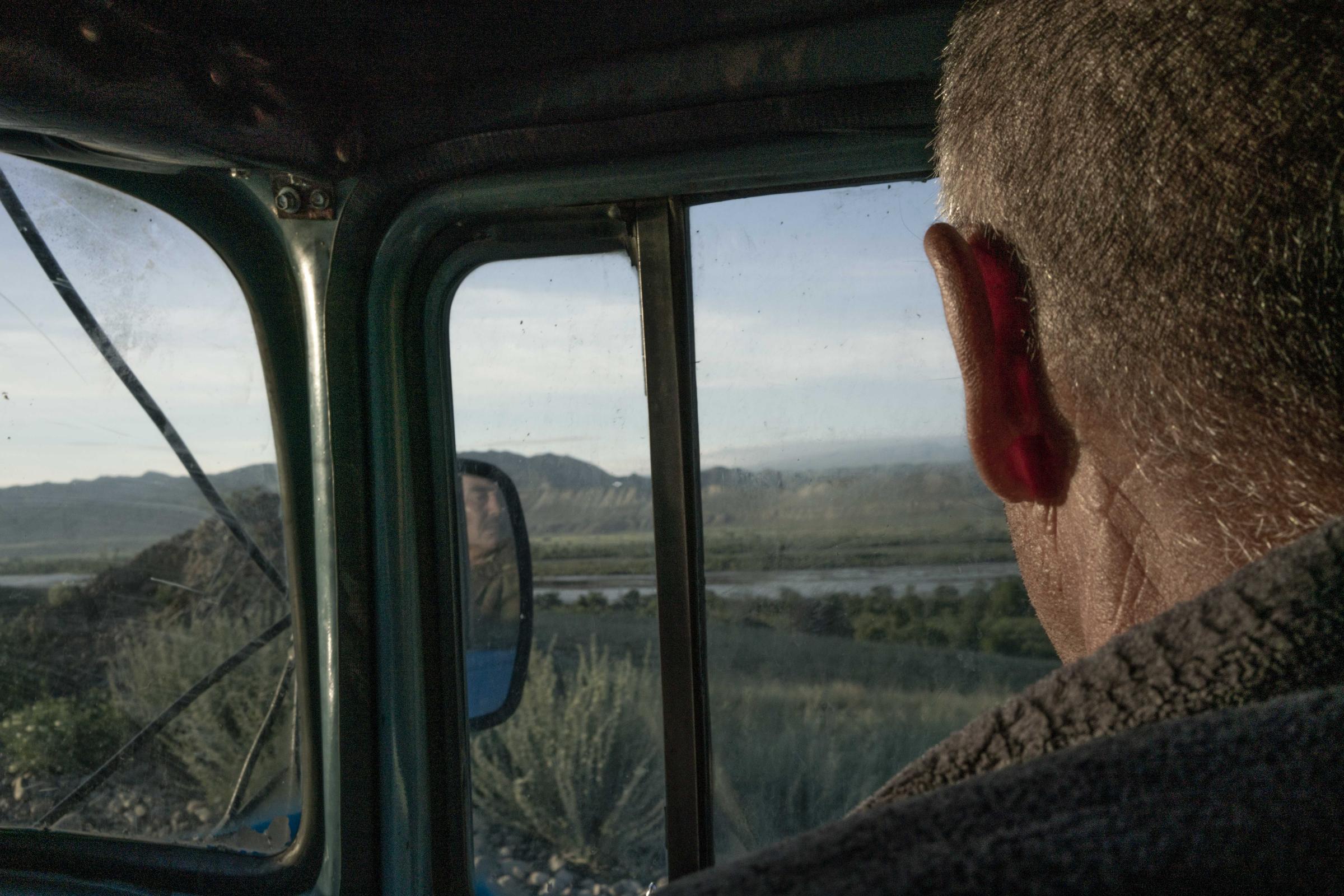 Nomads - Zamir looks out onto the gradually transforming landscape as he rides from the village of Akkya...