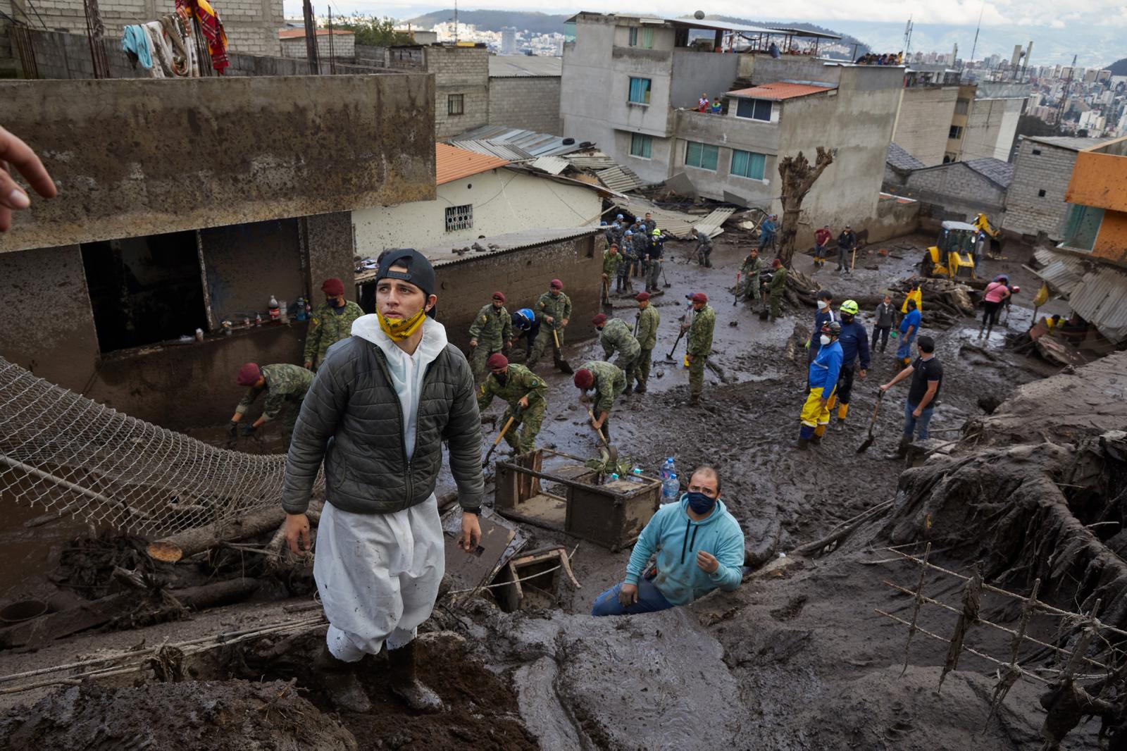 Neighbors and rescue groups hel...Ecuador, Tuesday, Feb. 1, 2022.