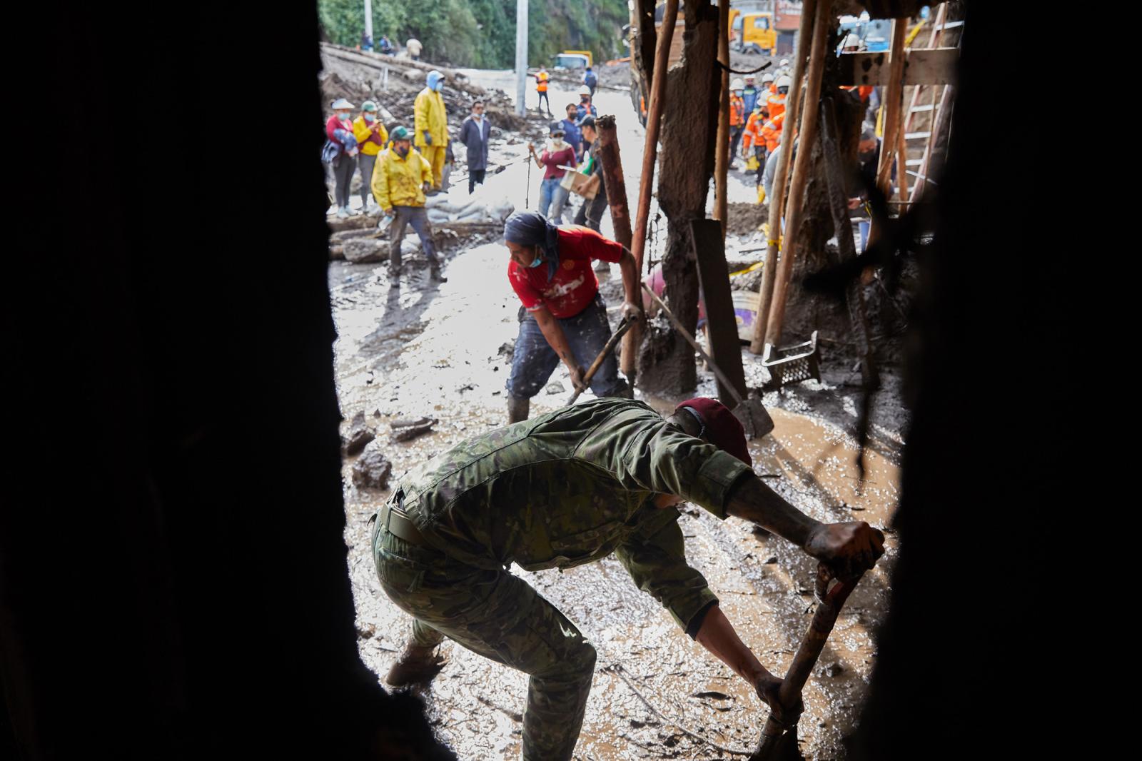 Military personnel help to remo...Ecuador, Tuesday, Feb. 1, 2022.