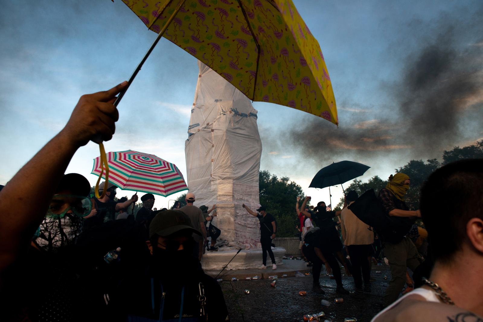 The Storming of the Columbus Statue  - Protestors briefly occupy the area surrounding the Columbus Statue in Grant Park.