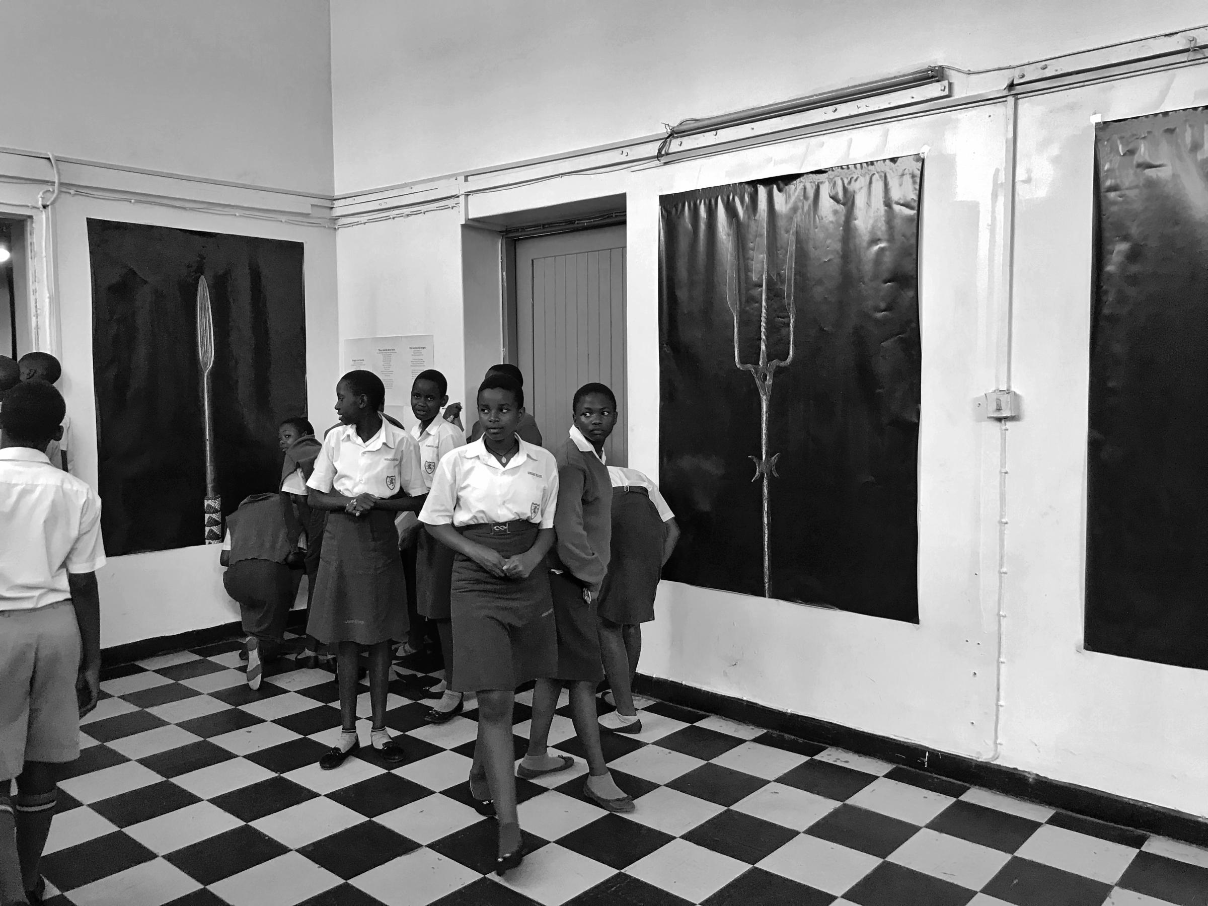 Spears a portrait of our culture, March 2020. - Students viewing portraits of Spears at the exhibition hall, Uganda museum.