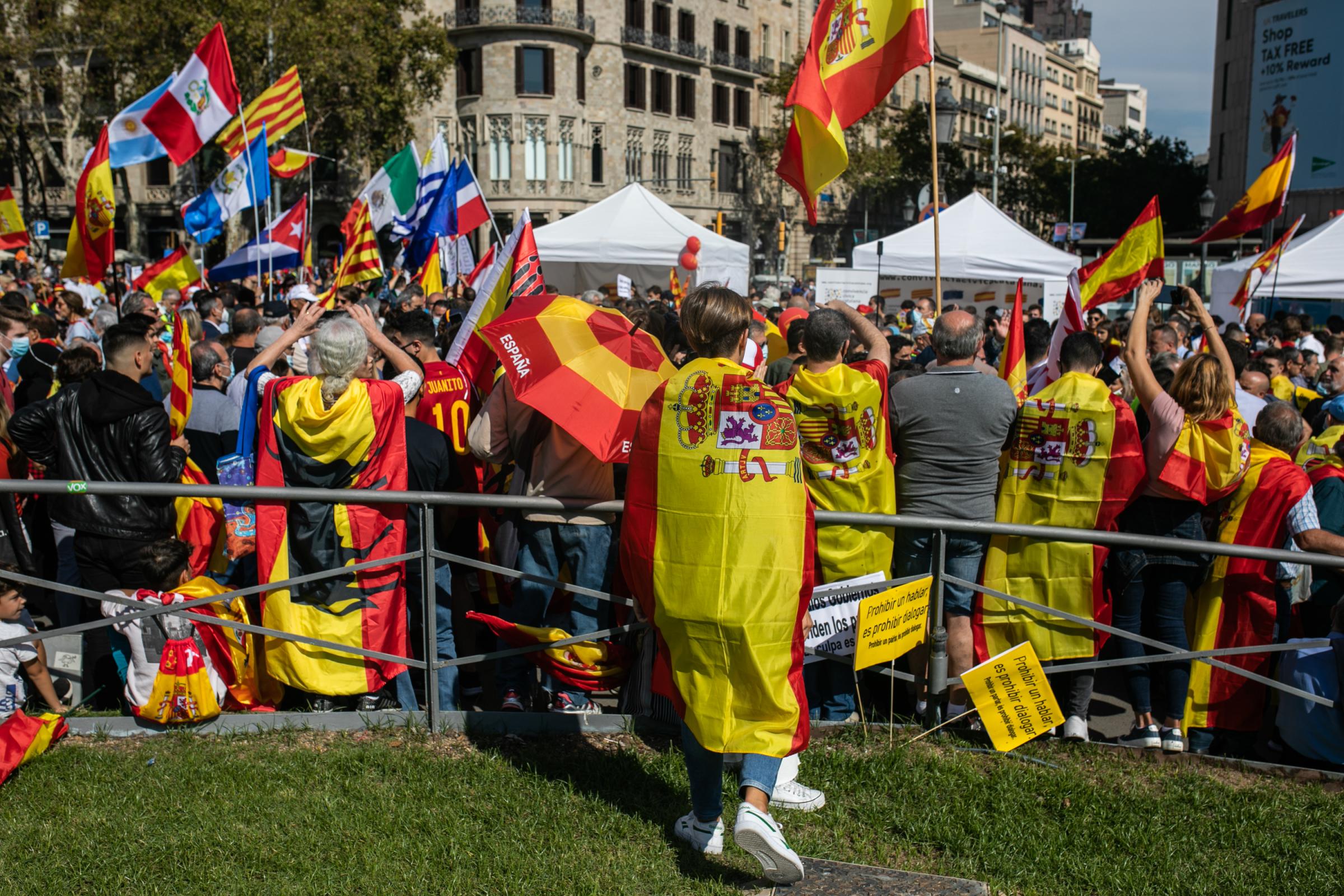 Spain's National Day Overshadowed By Colonialist Past  - BARCELONA, SPAIN - OCTOBER 12: People at the main...