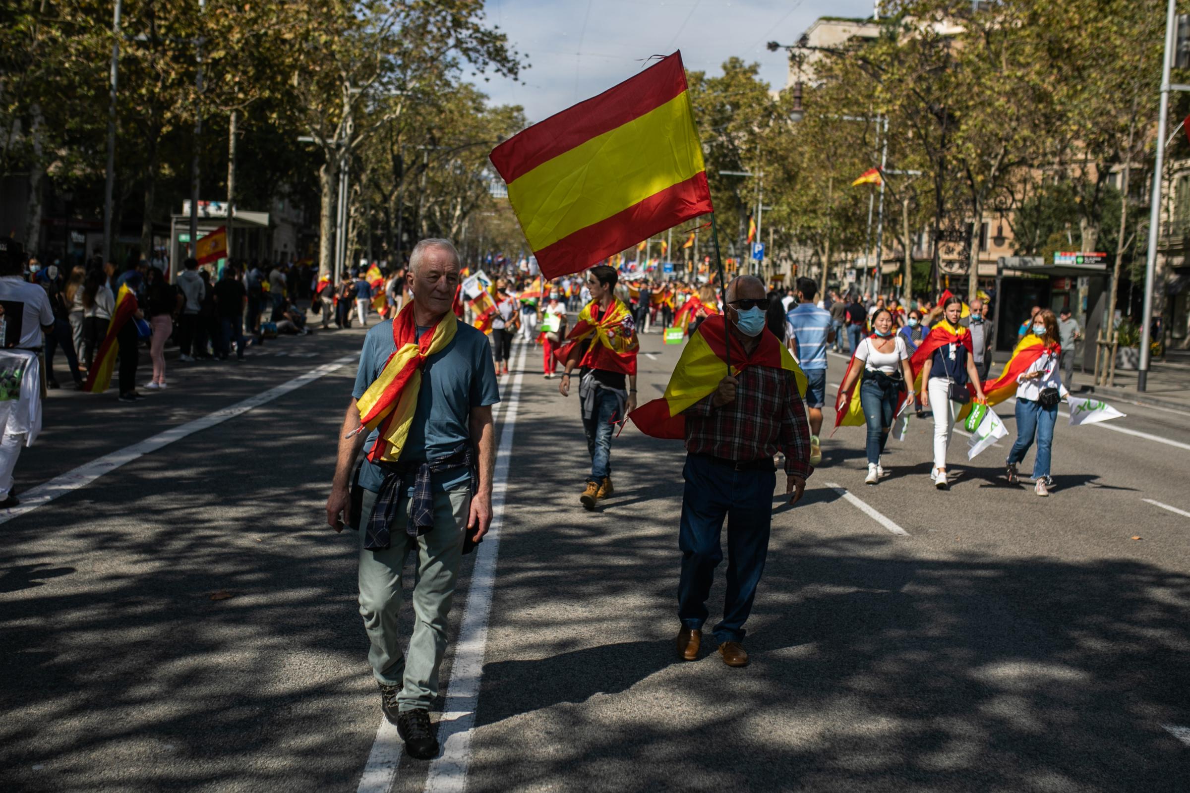 Spain's National Day Overshadowed By Colonialist Past  - BARCELONA, SPAIN - OCTOBER 12: People at the main...