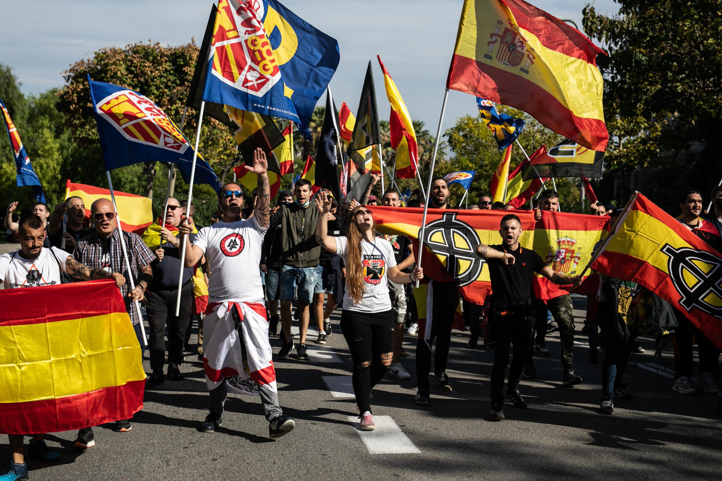 Spain's National Day Overshadowed By Colonialist Past  - BARCELONA, SPAIN - OCTOBER 12: A person makes the Nazi...