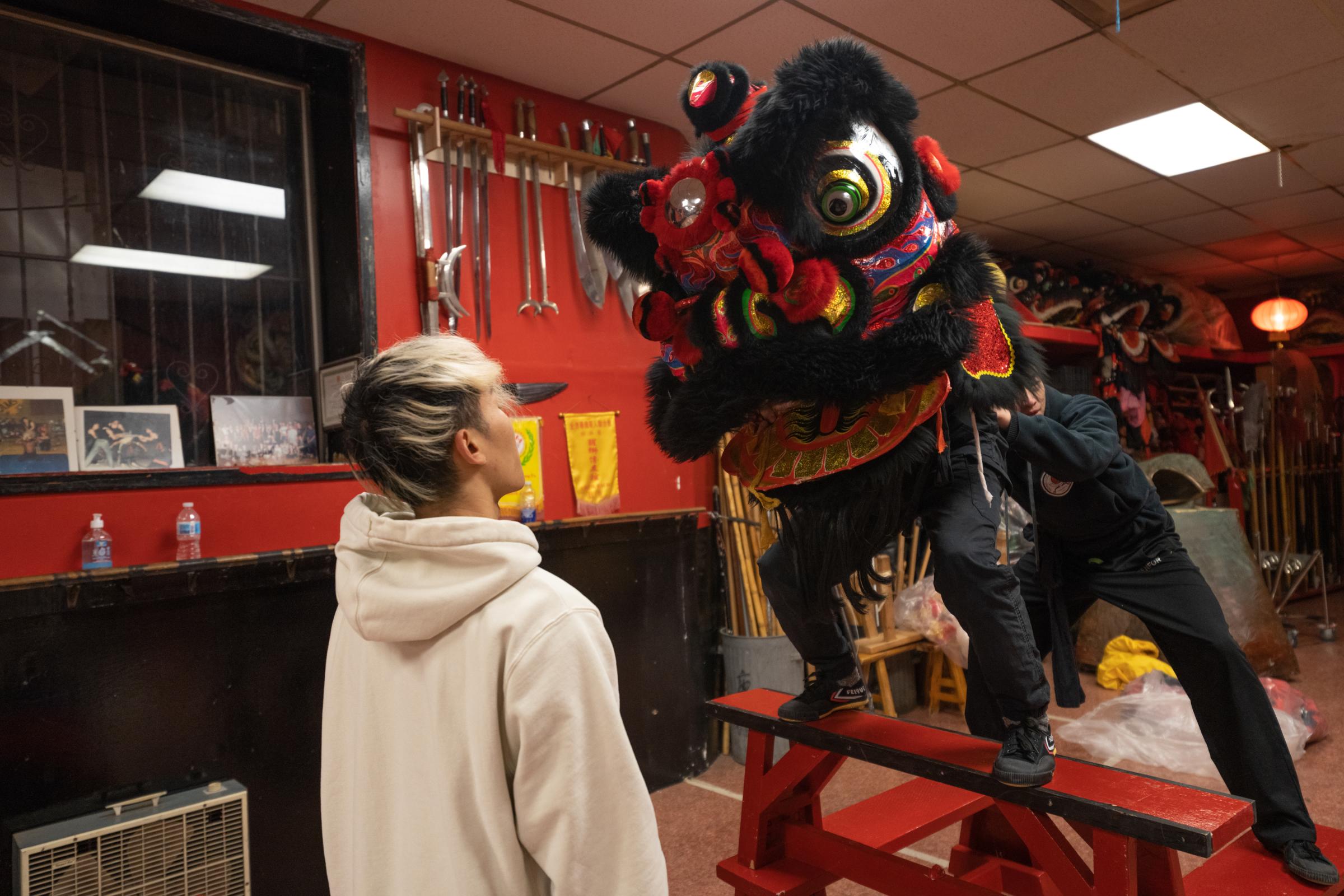 [Globe and Mail] Dance of the Lion, Year of the Tiger - Don Tan, 28, of the lion dance team at the Hong Luck Kung...