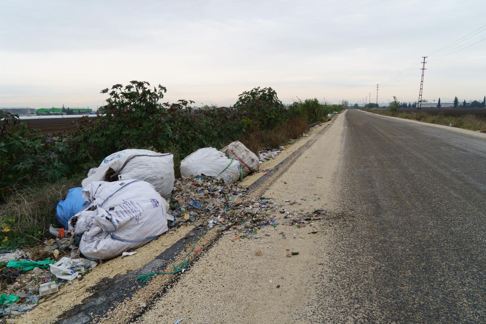  Plastic waste from England and...the river. Adana, Turkey 2021. 