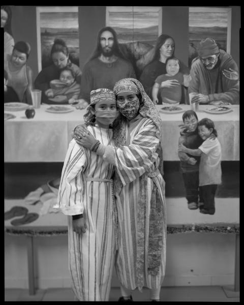 Image from Promised Land - Rosario y su hija, 2021  Rosario and her daughter try on...