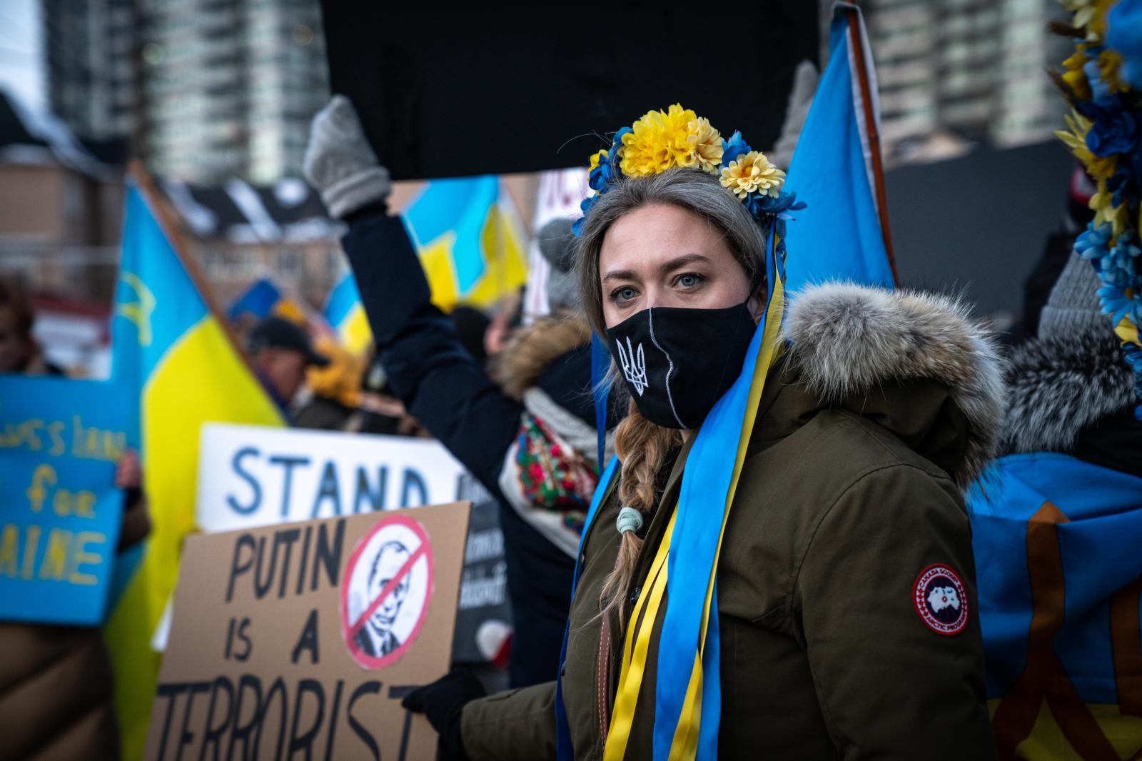 A protestor wearing a vinok, a ...o, Canada on February 25, 2022.