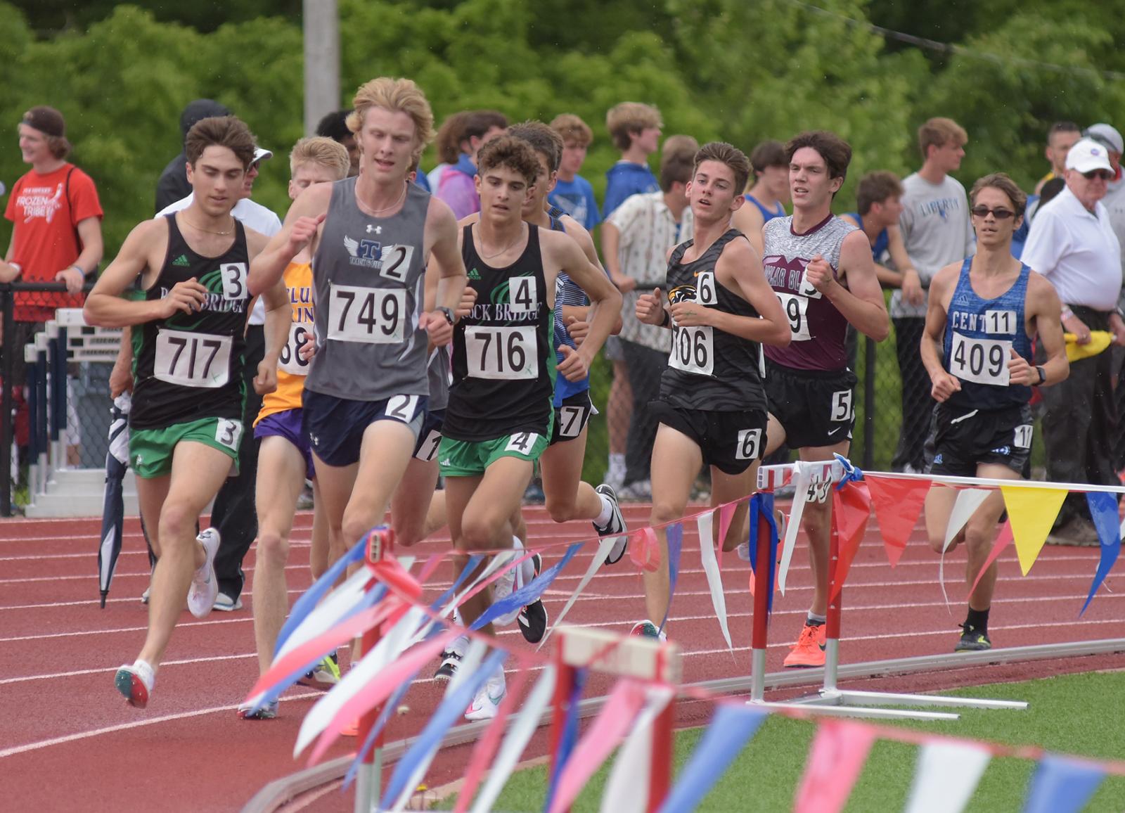 Rock Bridge runner Matthew Hauser, left, runs during the 3,200 meter run on Thursday, May 27, 2021 at Adkins Stadium in Jefferson City. Hauser placed second in the race 9 minutes 18.50 seconds. Megan Matty/Missourian