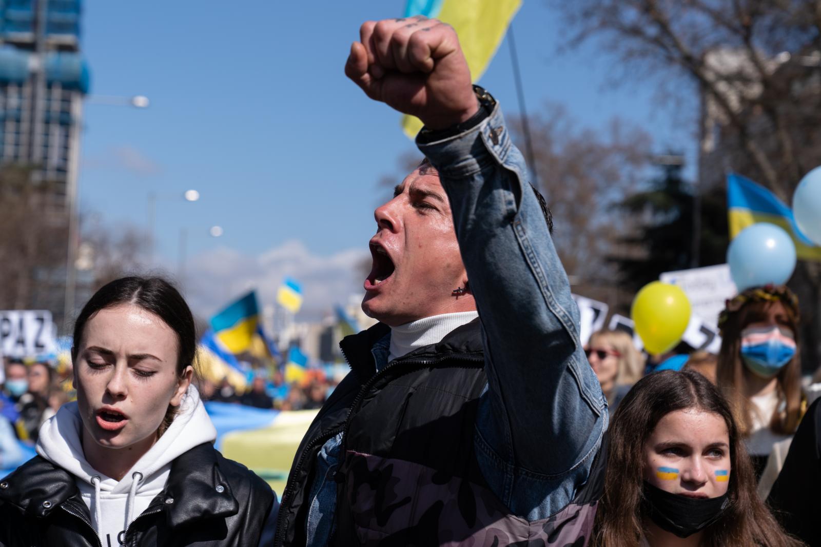 A man shouting slogans during t...he Russian invasion of Ukraine.
