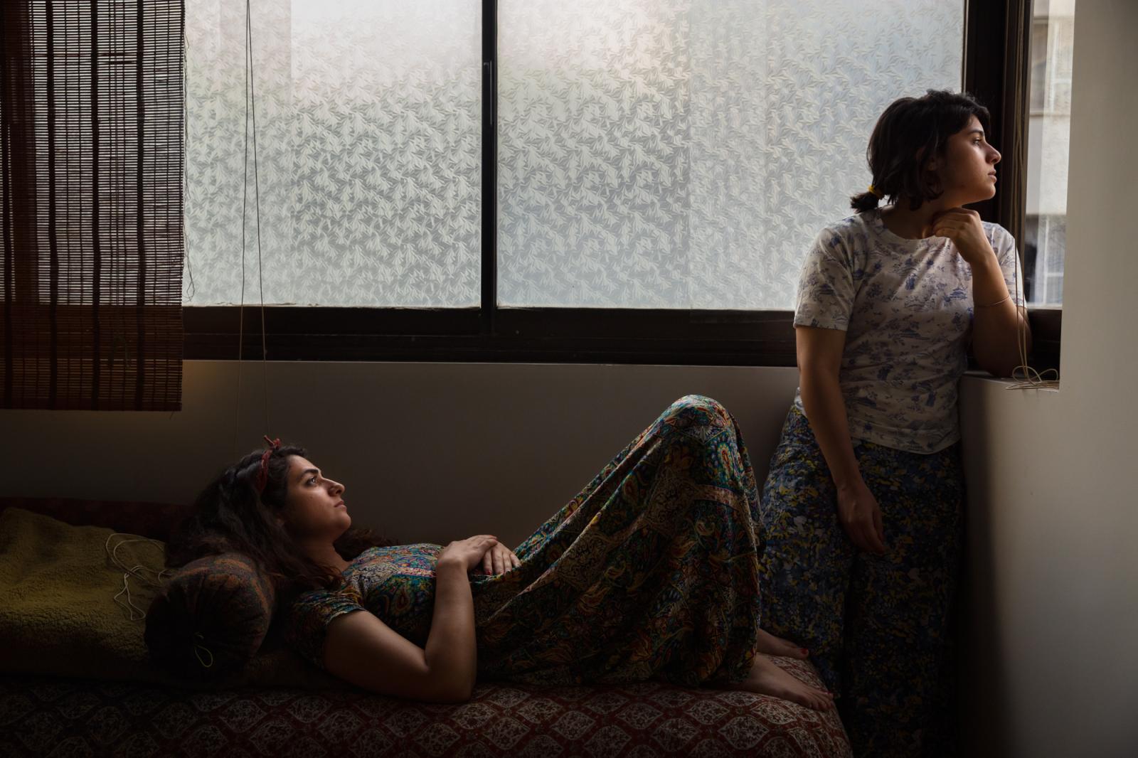Tara (L) and her friend Sara (R... to seek a better life abroad.