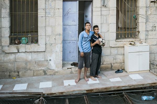 Image from Palestine -  Two Palestinian Boys on their back porch above...