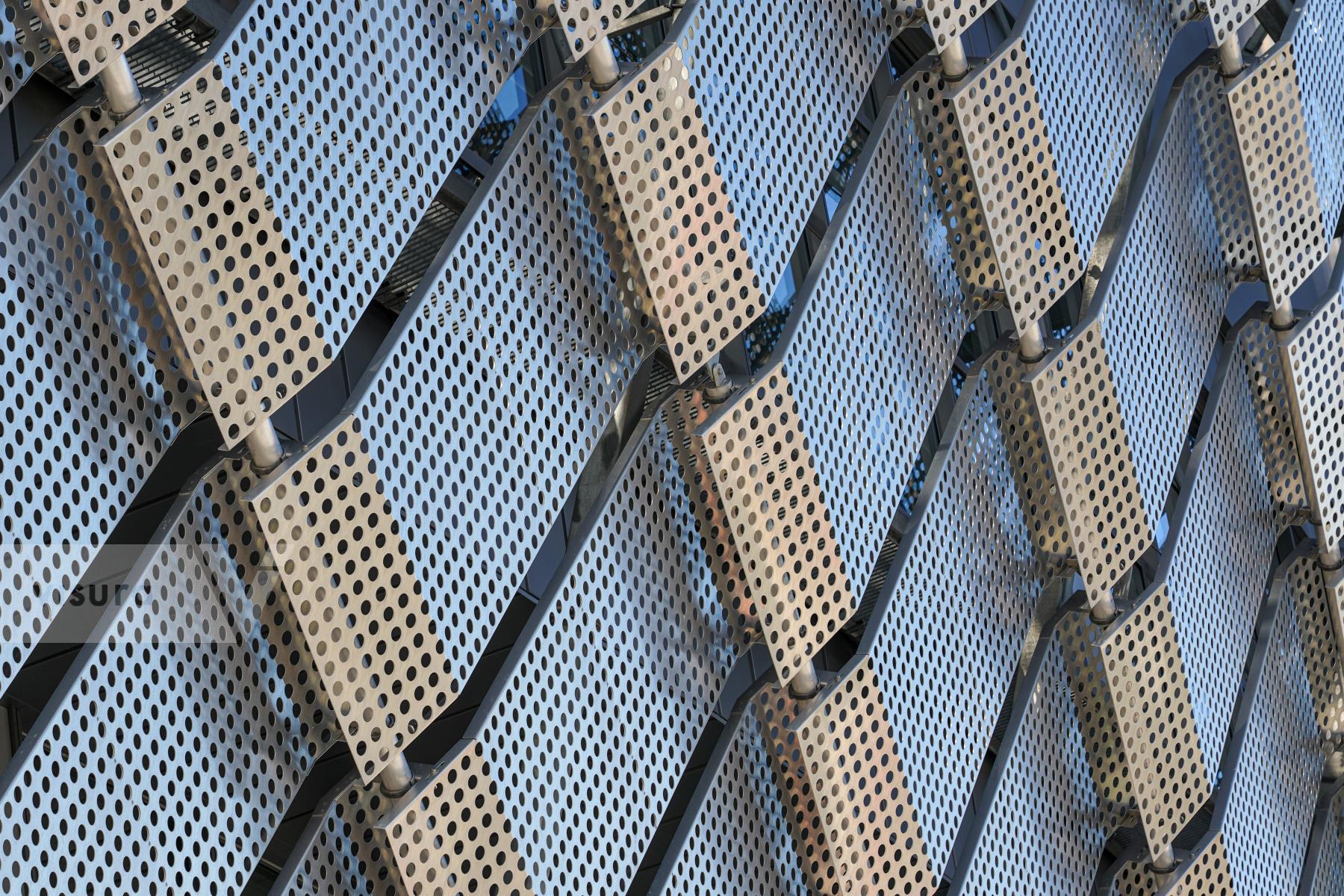 Purchase Patterned Precision: Rows of perforated Metal Panels by Michael Nguyen