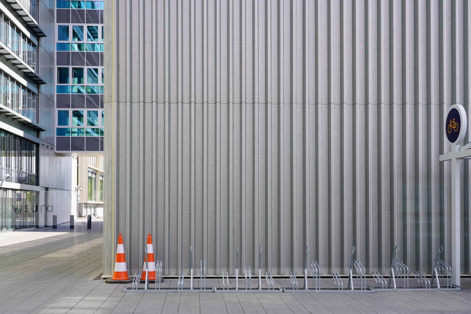 Purchase Gleaming Metal: A Row of Bicycles Racks by Michael Nguyen