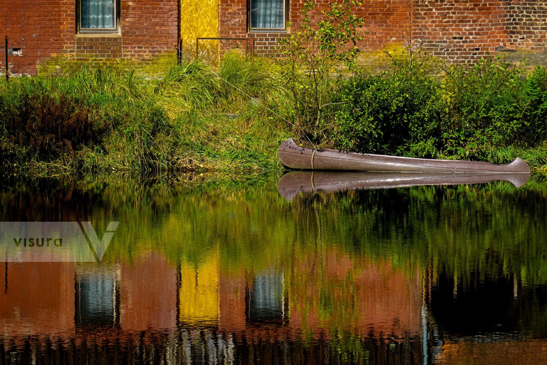 Purchase By the Schwarzer Regen River in Teisnach: A Canoe rests quietly  by Michael Nguyen