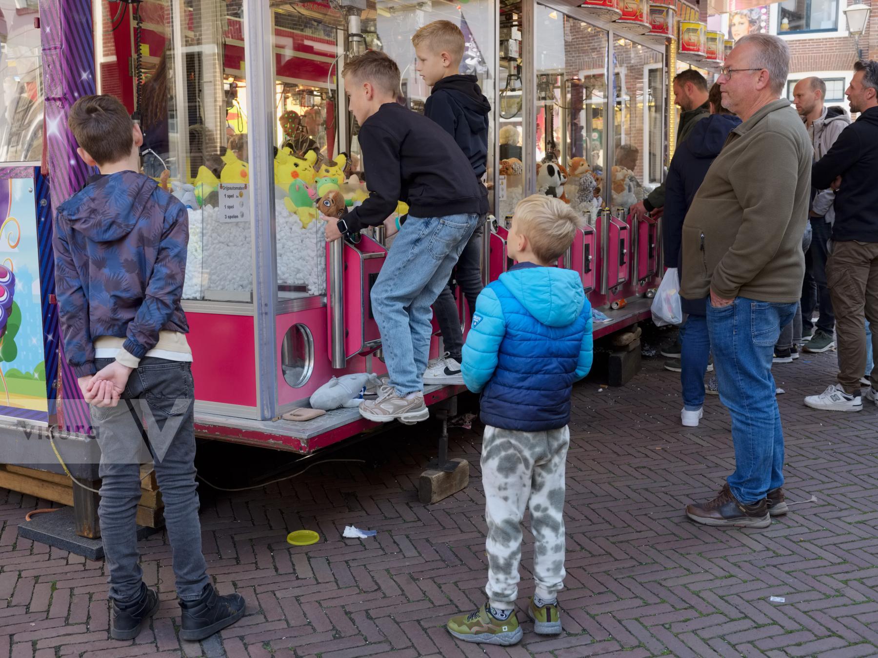 Purchase Claw Game at Fair by Ellen Kok