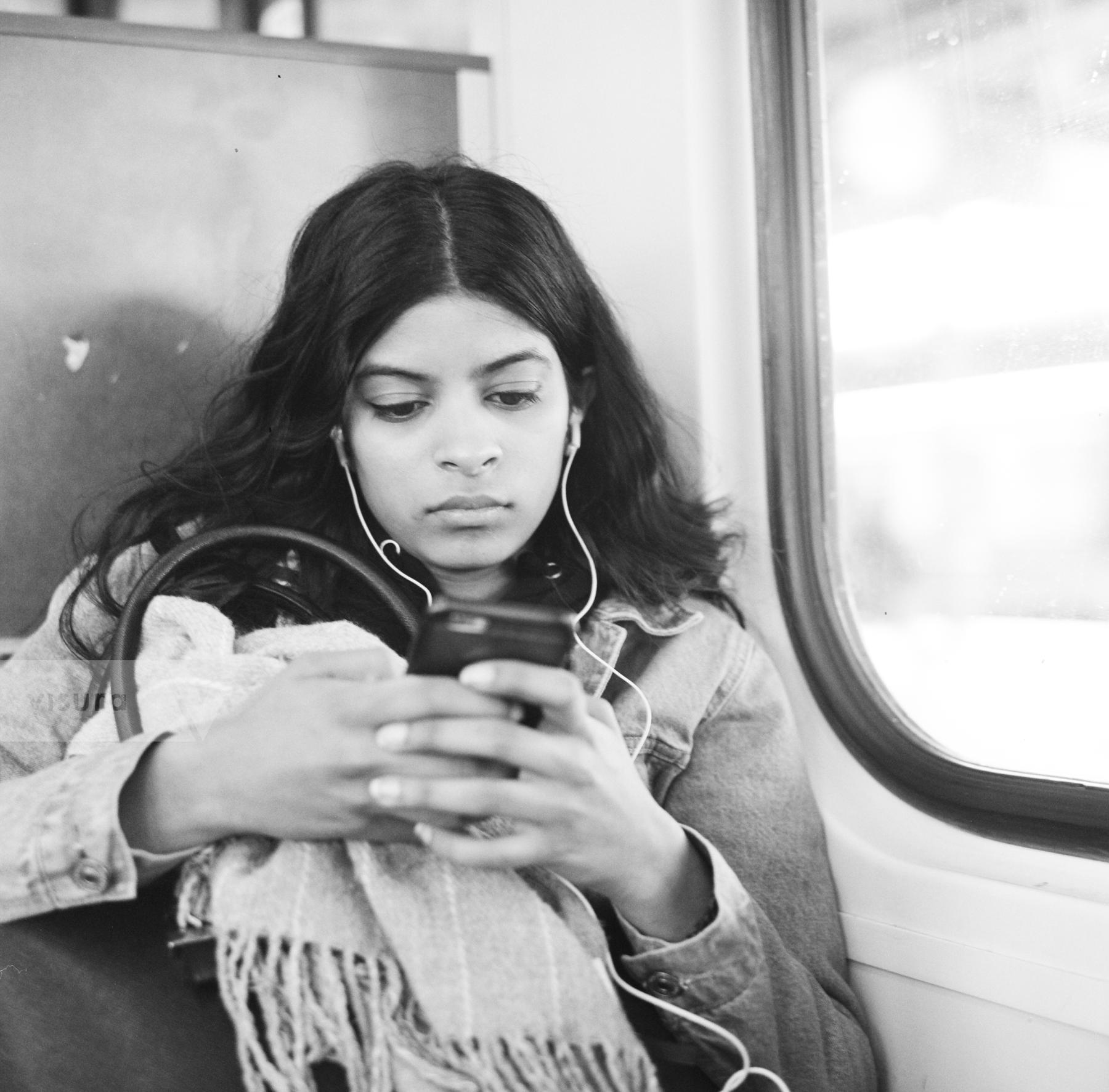 Purchase Young Woman on Train - Berlin, Germany  by Hannah Kozak