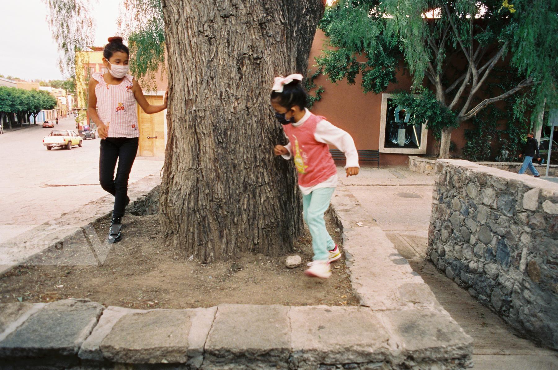 Purchase Children Playing in San Miguel de Allende by Hannah Kozak