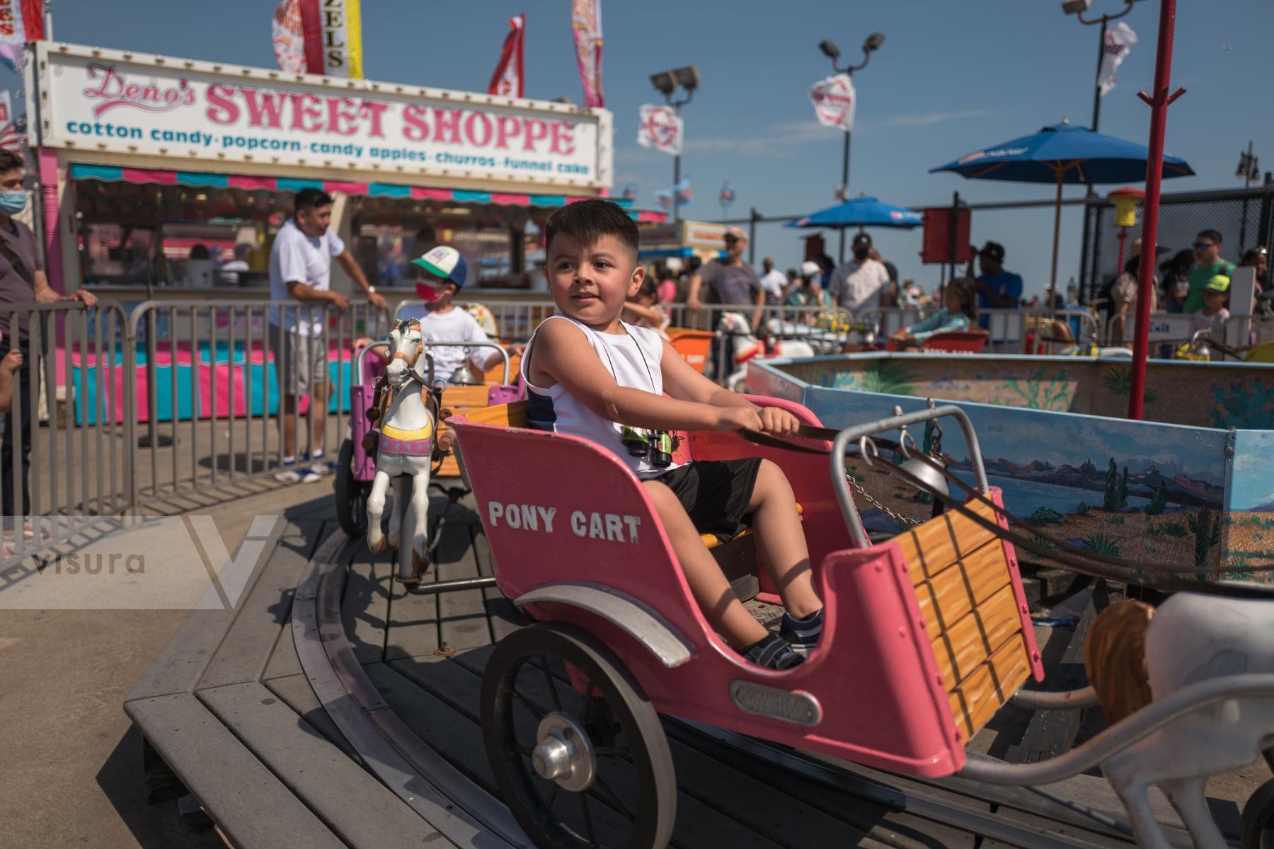 Purchase Child on Ride,Coney Island, July 2021 by Susan Rosenberg Jones