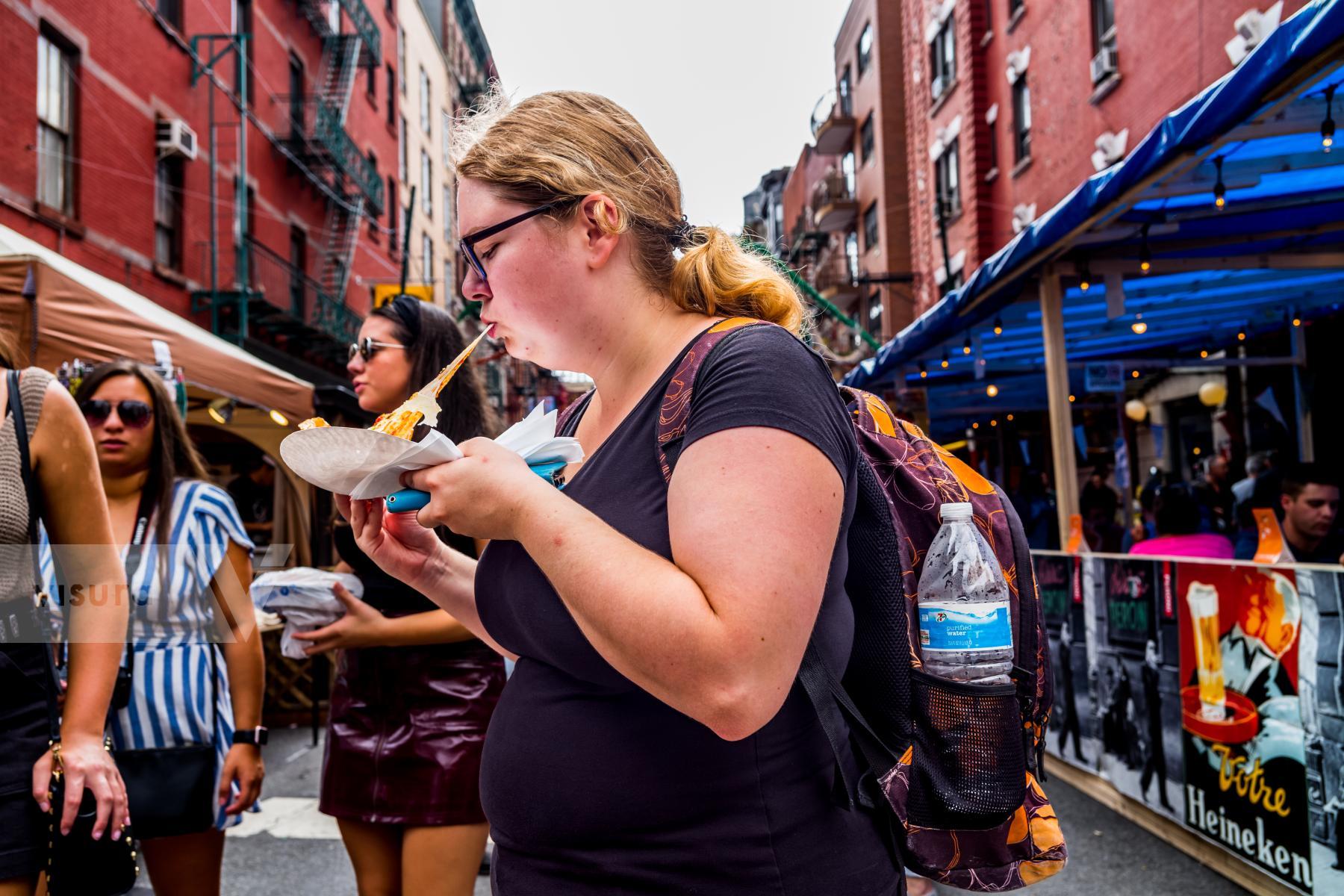 Purchase Public Display of Eating 180915075 by Kenneth Nelson