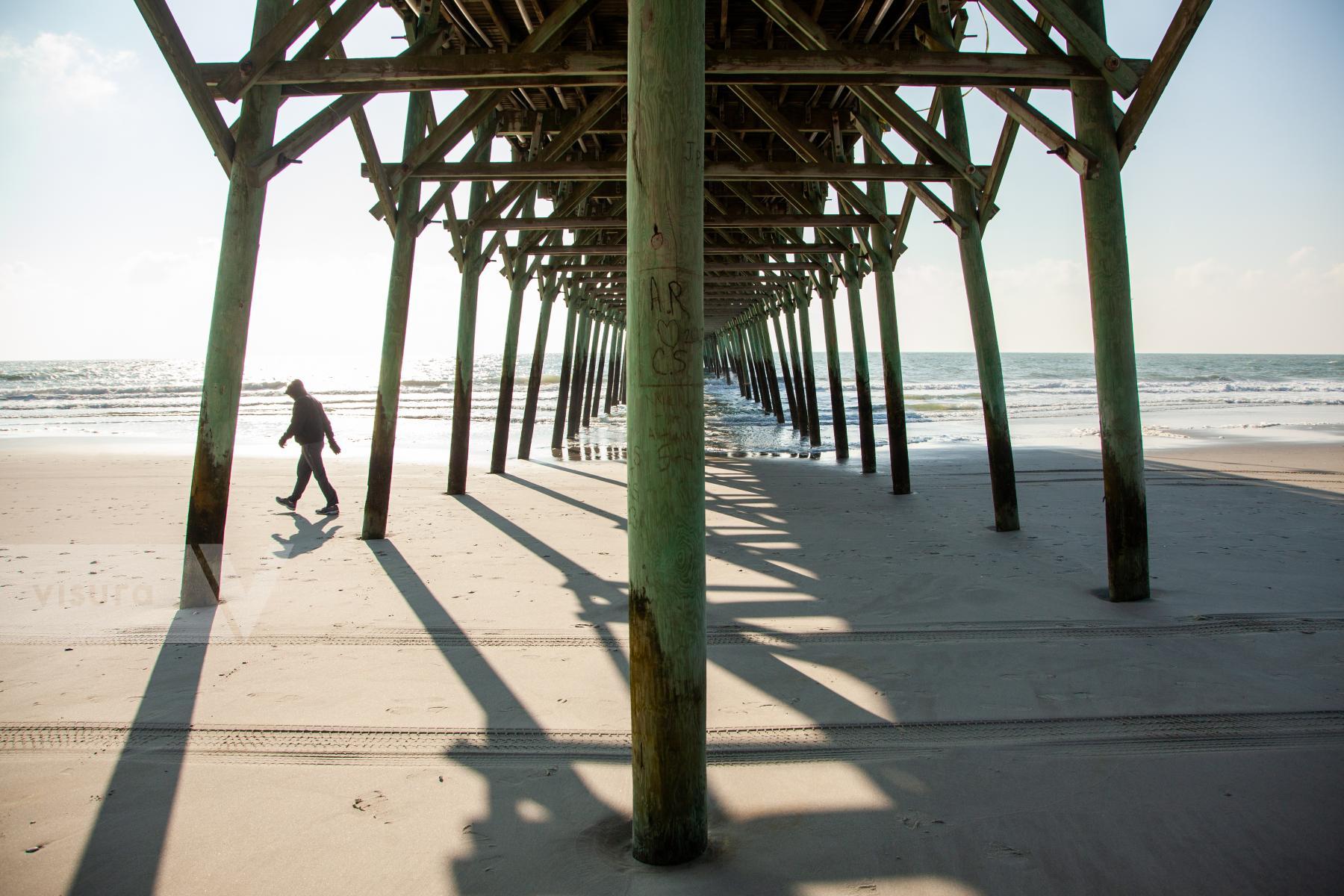 Purchase Walking Under the Pier on the South Carolina Coast by Katie Linsky Shaw