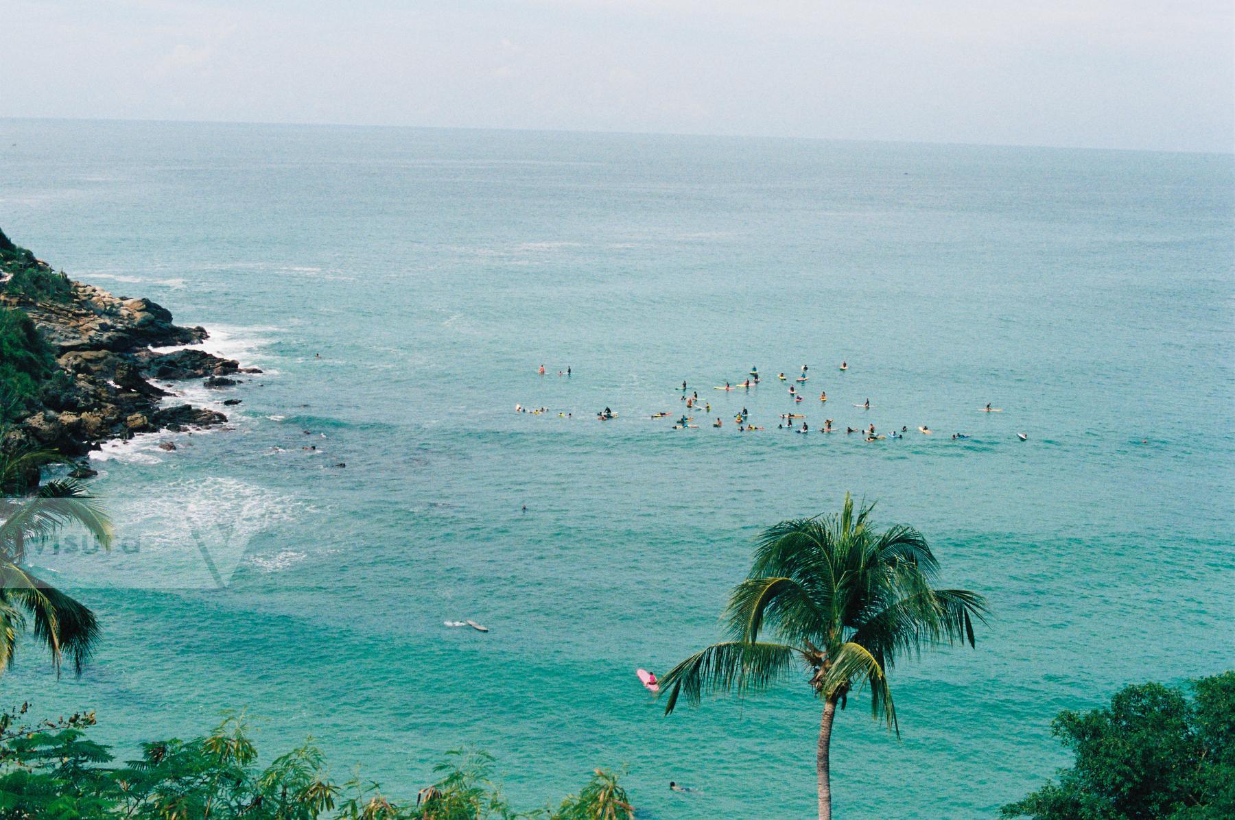 Purchase Surfers at Playa Carrizalillo  by Hannah Kozak