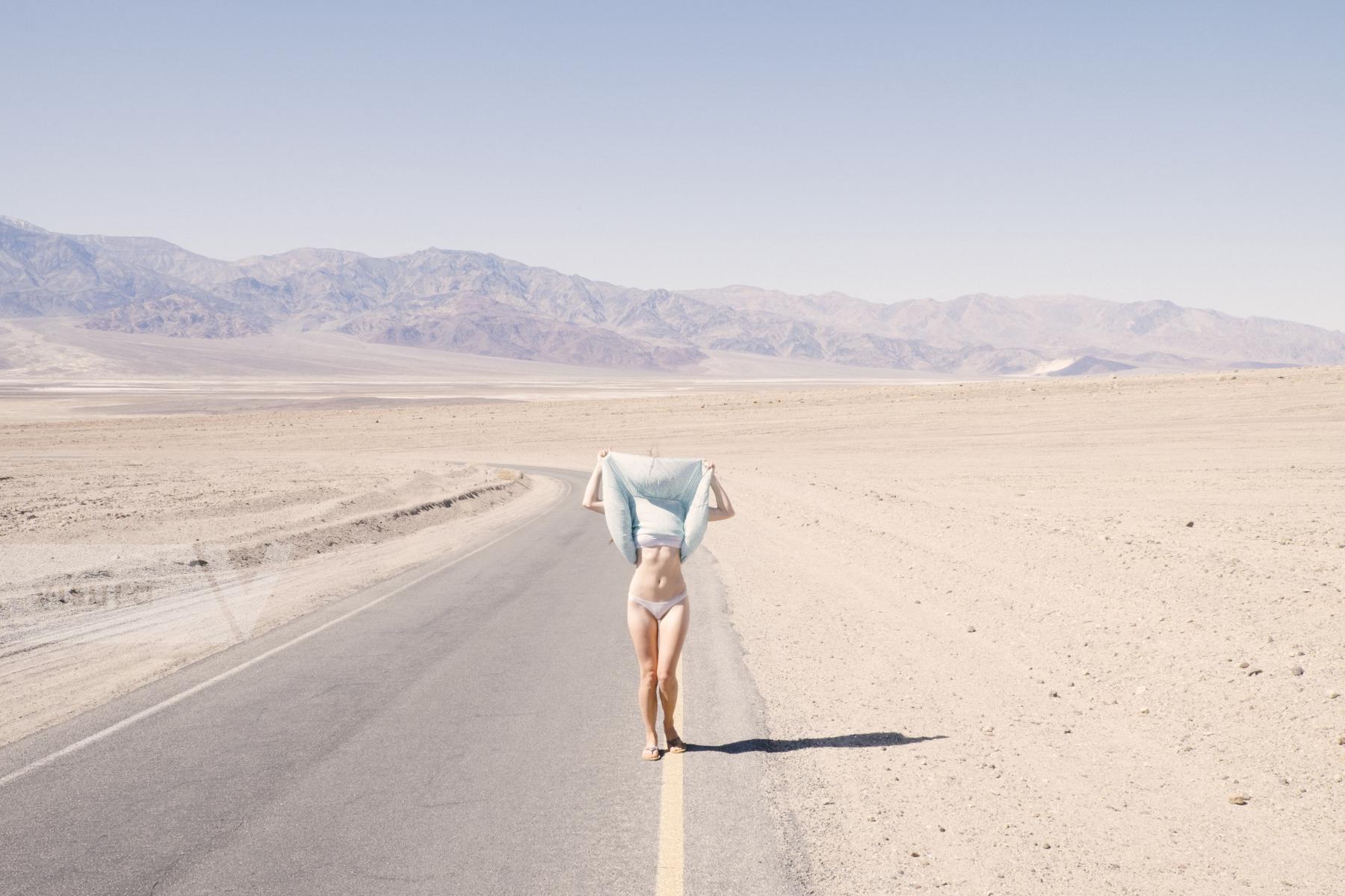 Purchase Woman on Highway, Death Valley by Matt Propert