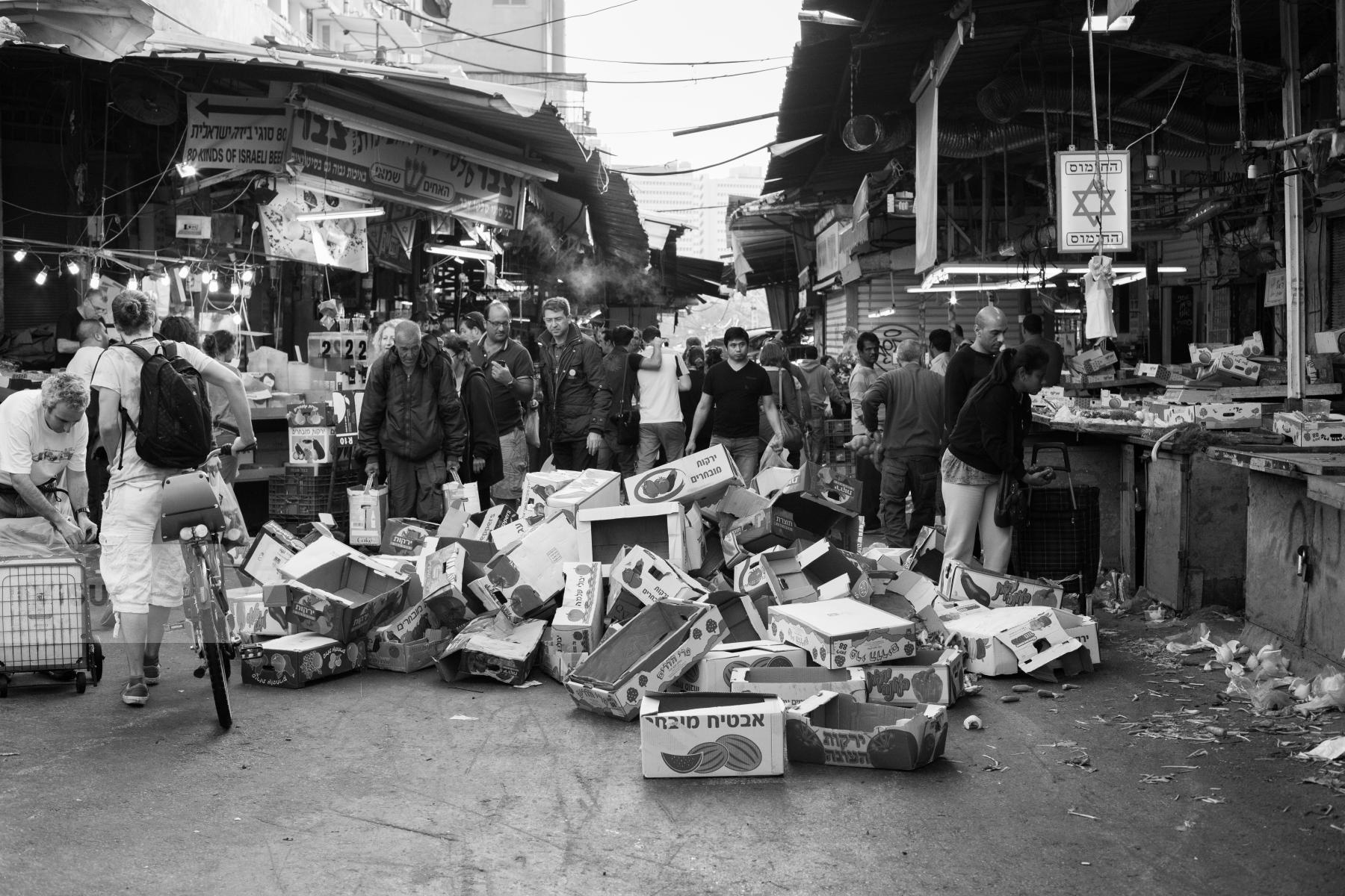 Purchase Crowded and dirty Carmel market during Friday. by Victor Bezrukov