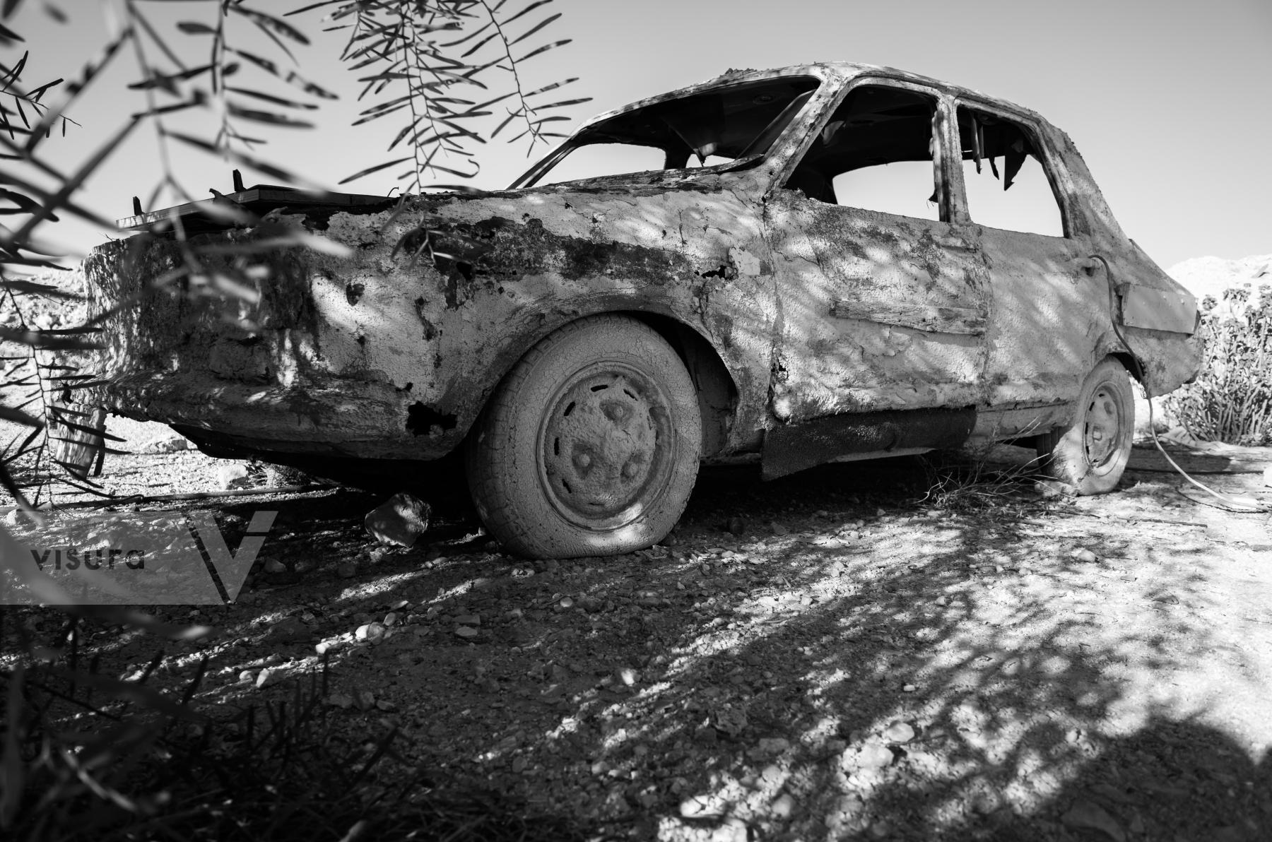 Purchase Rusted abandoned old car.in Southern desert. by Victor Bezrukov