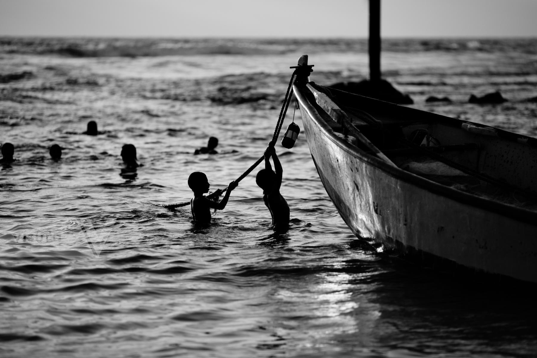 Purchase Kids playing in the sea by Victor Bezrukov