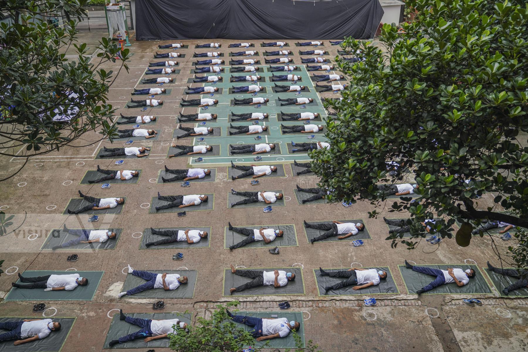 Purchase Bangladesh police attend a yoga session during COVID-19. by Zabed Hasnain Chowdhury